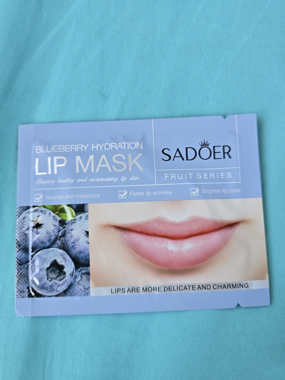 Kate Spade Wristlet, Lip Mask, Face Mask, & Earrings - Picture 10 of 11